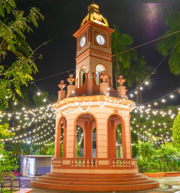kiosk illuminated at night. ahuachapan central park, el salvador