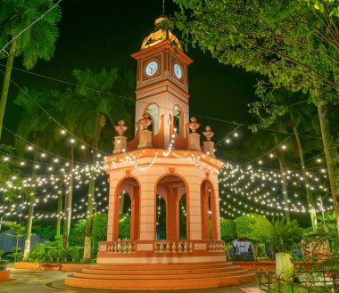 kiosk illuminated at night. ahuachapan central park, el salvador