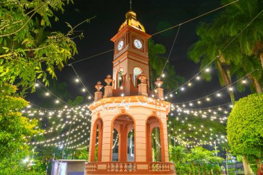 kiosk illuminated at night. ahuachapan central park, el salvador