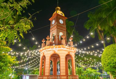 kiosk illuminated at night. ahuachapan central park, el salvador