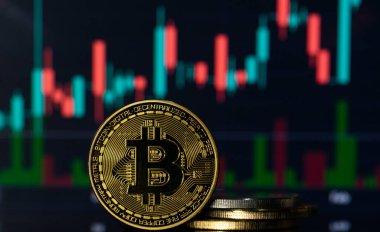 Bitcoin with a blurred background financial charts