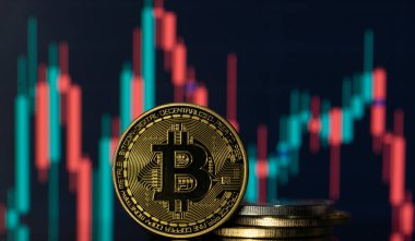 Bitcoin with a blurred background financial charts