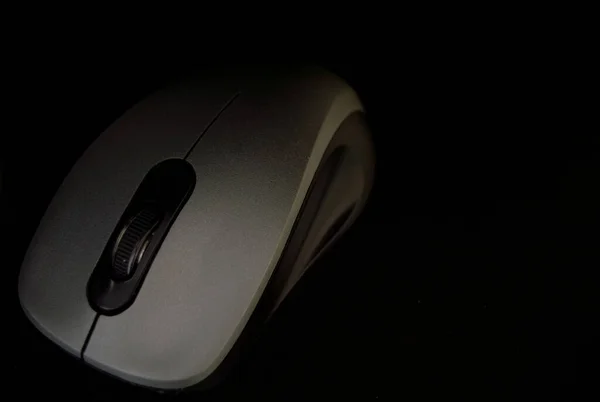 black background and black computer mouse