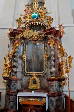 The small altar in the left part of the hall of the Sazava monastery (Czech Republic)