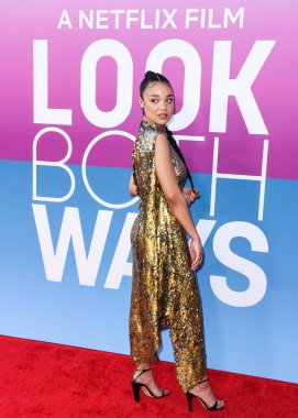 Australian actress Aisha Dee arrives at the Los Angeles Premiere Of Netflix's 'Look Both Ways' held at the Netflix Tudum Theater on August 16, 2022 in Hollywood, Los Angeles, California, United States. 