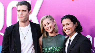American actor David Corenswet, American actress Lili Reinhart wearing Miu Miu and American actor Danny Ramirez arrive at the Los Angeles Premiere Of Netflix's 'Look Both Ways' held at the Netflix Tudum Theater on August 16, 2022 in Hollywood