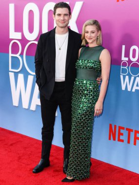 American actor David Corenswet and American actress Lili Reinhart wearing Miu Miu arrive at the Los Angeles Premiere Of Netflix's 'Look Both Ways' held at the Netflix Tudum Theater on August 16, 2022 in Hollywood, Los Angeles, California
