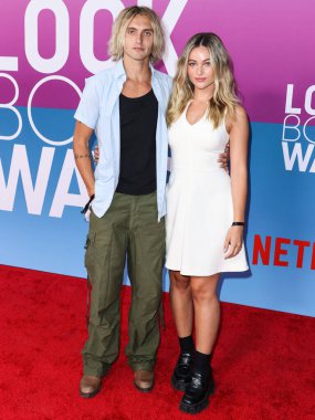 American actor Hart Denton and girlfriend Elysee Sanville arrive at the Los Angeles Premiere Of Netflix's 'Look Both Ways' held at the Netflix Tudum Theater on August 16, 2022 in Hollywood, Los Angeles, California, United States. 