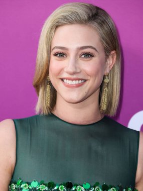 American actress Lili Reinhart wearing Miu Miu arrives at the Los Angeles Premiere Of Netflix's 'Look Both Ways' held at the Netflix Tudum Theater on August 16, 2022 in Hollywood, Los Angeles, California, United States. 