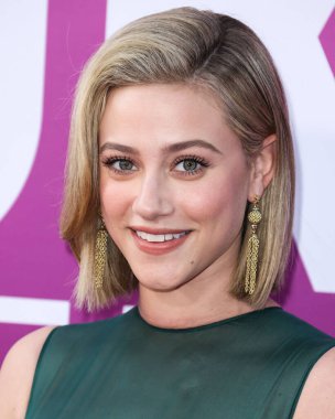 American actress Lili Reinhart wearing Miu Miu arrives at the Los Angeles Premiere Of Netflix's 'Look Both Ways' held at the Netflix Tudum Theater on August 16, 2022 in Hollywood, Los Angeles, California, United States. 