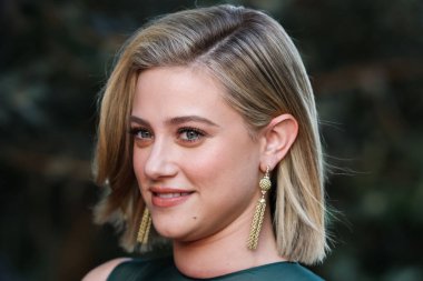 American actress Lili Reinhart wearing Miu Miu arrives at the Los Angeles Premiere Of Netflix's 'Look Both Ways' held at the Netflix Tudum Theater on August 16, 2022 in Hollywood, Los Angeles, California, United States. 