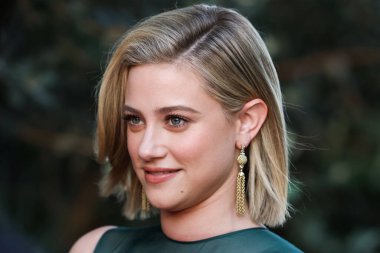 American actress Lili Reinhart wearing Miu Miu arrives at the Los Angeles Premiere Of Netflix's 'Look Both Ways' held at the Netflix Tudum Theater on August 16, 2022 in Hollywood, Los Angeles, California, United States. 