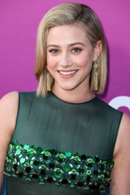 American actress Lili Reinhart wearing Miu Miu arrives at the Los Angeles Premiere Of Netflix's 'Look Both Ways' held at the Netflix Tudum Theater on August 16, 2022 in Hollywood, Los Angeles, California, United States. 