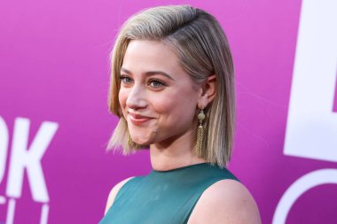 American actress Lili Reinhart wearing Miu Miu arrives at the Los Angeles Premiere Of Netflix's 'Look Both Ways' held at the Netflix Tudum Theater on August 16, 2022 in Hollywood, Los Angeles, California, United States. 