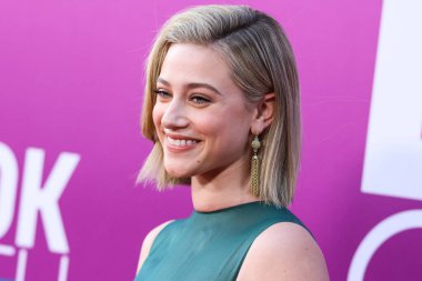 American actress Lili Reinhart wearing Miu Miu arrives at the Los Angeles Premiere Of Netflix's 'Look Both Ways' held at the Netflix Tudum Theater on August 16, 2022 in Hollywood, Los Angeles, California, United States. 