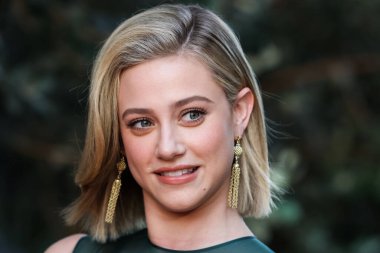 American actress Lili Reinhart wearing Miu Miu arrives at the Los Angeles Premiere Of Netflix's 'Look Both Ways' held at the Netflix Tudum Theater on August 16, 2022 in Hollywood, Los Angeles, California, United States. 