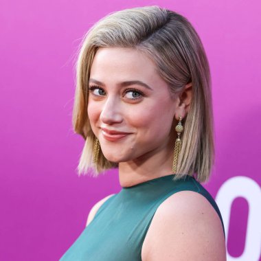American actress Lili Reinhart wearing Miu Miu arrives at the Los Angeles Premiere Of Netflix's 'Look Both Ways' held at the Netflix Tudum Theater on August 16, 2022 in Hollywood, Los Angeles, California, United States. 