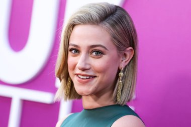 American actress Lili Reinhart wearing Miu Miu arrives at the Los Angeles Premiere Of Netflix's 'Look Both Ways' held at the Netflix Tudum Theater on August 16, 2022 in Hollywood, Los Angeles, California, United States. 