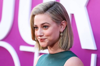 American actress Lili Reinhart wearing Miu Miu arrives at the Los Angeles Premiere Of Netflix's 'Look Both Ways' held at the Netflix Tudum Theater on August 16, 2022 in Hollywood, Los Angeles, California, United States. 