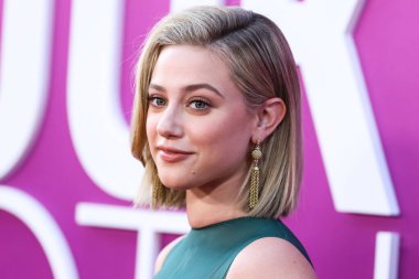 American actress Lili Reinhart wearing Miu Miu arrives at the Los Angeles Premiere Of Netflix's 'Look Both Ways' held at the Netflix Tudum Theater on August 16, 2022 in Hollywood, Los Angeles, California, United States. 