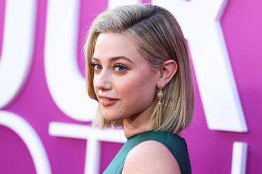American actress Lili Reinhart wearing Miu Miu arrives at the Los Angeles Premiere Of Netflix's 'Look Both Ways' held at the Netflix Tudum Theater on August 16, 2022 in Hollywood, Los Angeles, California, United States. 
