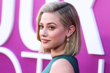 American actress Lili Reinhart wearing Miu Miu arrives at the Los Angeles Premiere Of Netflix's 'Look Both Ways' held at the Netflix Tudum Theater on August 16, 2022 in Hollywood, Los Angeles, California, United States. 
