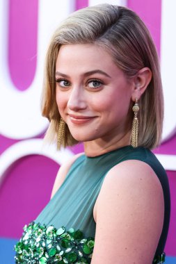 American actress Lili Reinhart wearing Miu Miu is interviewed by Entertainment Tonight (ET) at the Los Angeles Premiere Of Netflix's 'Look Both Ways' held at the Netflix Tudum Theater on August 16, 2022 in Hollywood, Los Angeles, California