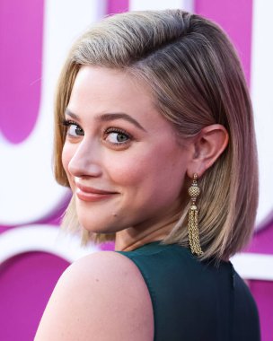 American actress Lili Reinhart wearing Miu Miu is interviewed by Entertainment Tonight (ET) at the Los Angeles Premiere Of Netflix's 'Look Both Ways' held at the Netflix Tudum Theater on August 16, 2022 in Hollywood, Los Angeles, California