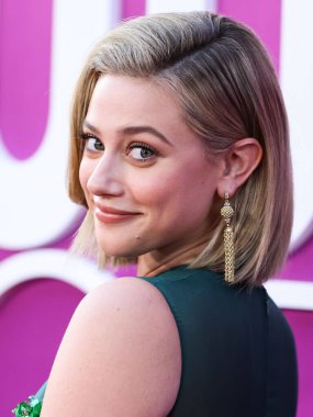 American actress Lili Reinhart wearing Miu Miu is interviewed by Entertainment Tonight (ET) at the Los Angeles Premiere Of Netflix's 'Look Both Ways' held at the Netflix Tudum Theater on August 16, 2022 in Hollywood, Los Angeles, California