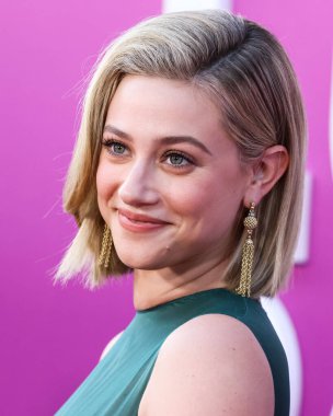 American actress Lili Reinhart wearing Miu Miu is interviewed by Entertainment Tonight (ET) at the Los Angeles Premiere Of Netflix's 'Look Both Ways' held at the Netflix Tudum Theater on August 16, 2022 in Hollywood, Los Angeles, California