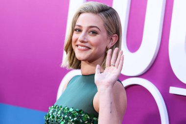 American actress Lili Reinhart wearing Miu Miu is interviewed by Entertainment Tonight (ET) at the Los Angeles Premiere Of Netflix's 'Look Both Ways' held at the Netflix Tudum Theater on August 16, 2022 in Hollywood, Los Angeles, California