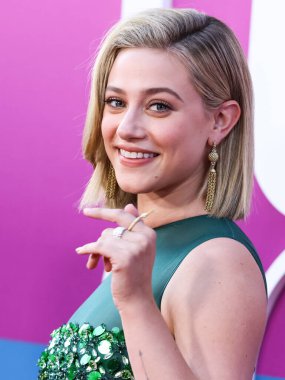 American actress Lili Reinhart wearing Miu Miu is interviewed by Entertainment Tonight (ET) at the Los Angeles Premiere Of Netflix's 'Look Both Ways' held at the Netflix Tudum Theater on August 16, 2022 in Hollywood, Los Angeles, California