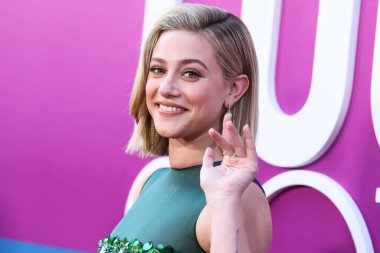 American actress Lili Reinhart wearing Miu Miu is interviewed by Entertainment Tonight (ET) at the Los Angeles Premiere Of Netflix's 'Look Both Ways' held at the Netflix Tudum Theater on August 16, 2022 in Hollywood, Los Angeles, California