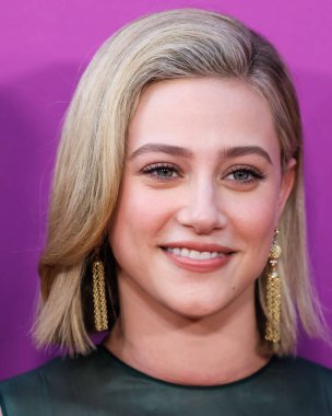 American actress Lili Reinhart wearing Miu Miu arrives at the Los Angeles Premiere Of Netflix's 'Look Both Ways' held at the Netflix Tudum Theater on August 16, 2022 in Hollywood, Los Angeles, California, United States. 