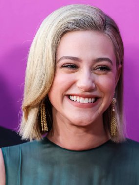 American actress Lili Reinhart wearing Miu Miu arrives at the Los Angeles Premiere Of Netflix's 'Look Both Ways' held at the Netflix Tudum Theater on August 16, 2022 in Hollywood, Los Angeles, California, United States. 