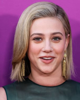 American actress Lili Reinhart wearing Miu Miu arrives at the Los Angeles Premiere Of Netflix's 'Look Both Ways' held at the Netflix Tudum Theater on August 16, 2022 in Hollywood, Los Angeles, California, United States. 