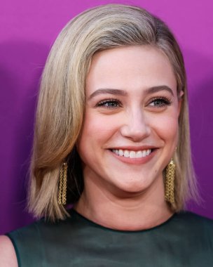 American actress Lili Reinhart wearing Miu Miu arrives at the Los Angeles Premiere Of Netflix's 'Look Both Ways' held at the Netflix Tudum Theater on August 16, 2022 in Hollywood, Los Angeles, California, United States. 