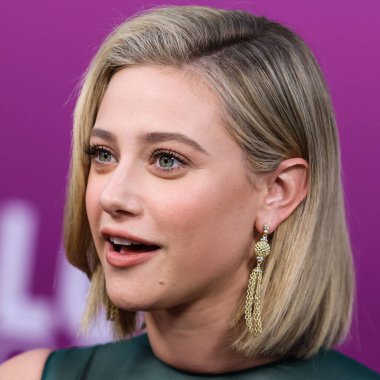 American actress Lili Reinhart wearing Miu Miu arrives at the Los Angeles Premiere Of Netflix's 'Look Both Ways' held at the Netflix Tudum Theater on August 16, 2022 in Hollywood, Los Angeles, California, United States. 