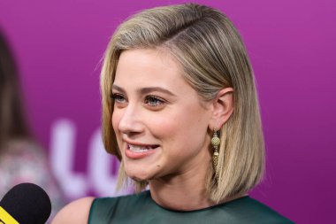 American actress Lili Reinhart wearing Miu Miu arrives at the Los Angeles Premiere Of Netflix's 'Look Both Ways' held at the Netflix Tudum Theater on August 16, 2022 in Hollywood, Los Angeles, California, United States. 