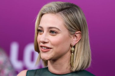 American actress Lili Reinhart wearing Miu Miu arrives at the Los Angeles Premiere Of Netflix's 'Look Both Ways' held at the Netflix Tudum Theater on August 16, 2022 in Hollywood, Los Angeles, California, United States. 