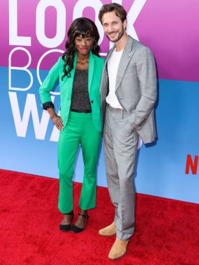 American actress Sufe Bradshaw and boyfriend/actor Matt Atwater arrive at the Los Angeles Premiere Of Netflix's 'Look Both Ways' held at the Netflix Tudum Theater on August 16, 2022 in Hollywood, Los Angeles, California, United States. 