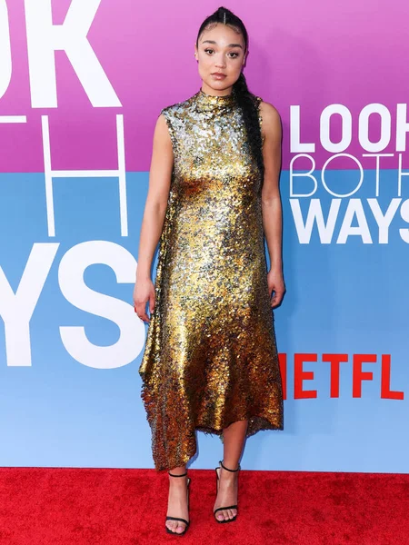 Australian actress Aisha Dee arrives at the Los Angeles Premiere Of Netflix's 'Look Both Ways' held at the Netflix Tudum Theater on August 16, 2022 in Hollywood, Los Angeles, California, United States. 