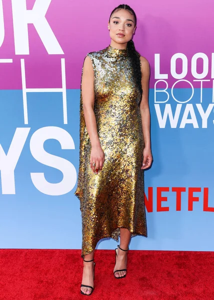 Australian actress Aisha Dee arrives at the Los Angeles Premiere Of Netflix's 'Look Both Ways' held at the Netflix Tudum Theater on August 16, 2022 in Hollywood, Los Angeles, California, United States. 