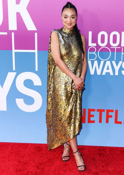 Australian actress Aisha Dee arrives at the Los Angeles Premiere Of Netflix's 'Look Both Ways' held at the Netflix Tudum Theater on August 16, 2022 in Hollywood, Los Angeles, California, United States. 