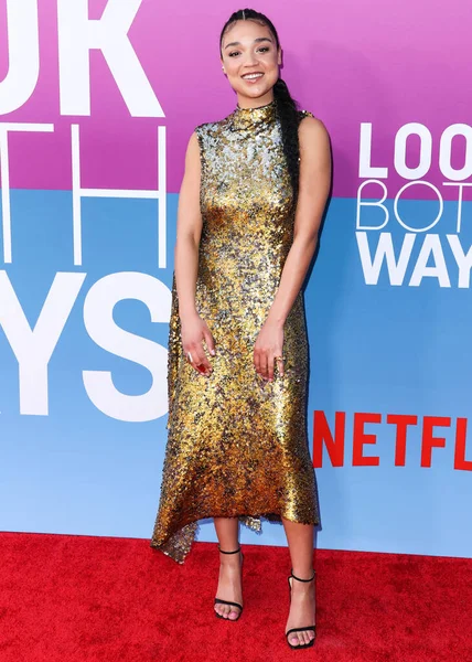 Australian actress Aisha Dee arrives at the Los Angeles Premiere Of Netflix's 'Look Both Ways' held at the Netflix Tudum Theater on August 16, 2022 in Hollywood, Los Angeles, California, United States. 