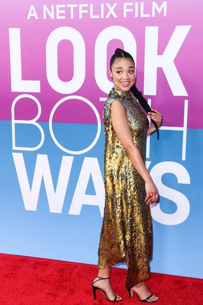 Australian actress Aisha Dee arrives at the Los Angeles Premiere Of Netflix's 'Look Both Ways' held at the Netflix Tudum Theater on August 16, 2022 in Hollywood, Los Angeles, California, United States. 