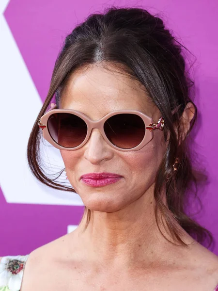 American actress Andrea Savage arrives at the Los Angeles Premiere Of Netflix's 'Look Both Ways' held at the Netflix Tudum Theater on August 16, 2022 in Hollywood, Los Angeles, California, United States. 