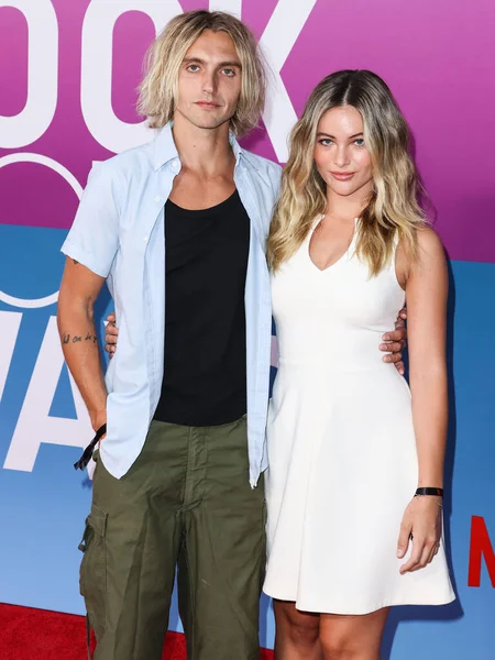 American actor Hart Denton and girlfriend Elysee Sanville arrive at the Los Angeles Premiere Of Netflix's 'Look Both Ways' held at the Netflix Tudum Theater on August 16, 2022 in Hollywood, Los Angeles, California, United States. 