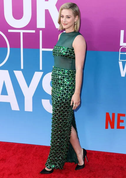 American actress Lili Reinhart wearing Miu Miu arrives at the Los Angeles Premiere Of Netflix's 'Look Both Ways' held at the Netflix Tudum Theater on August 16, 2022 in Hollywood, Los Angeles, California, United States. 