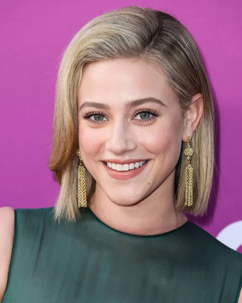 American actress Lili Reinhart wearing Miu Miu arrives at the Los Angeles Premiere Of Netflix's 'Look Both Ways' held at the Netflix Tudum Theater on August 16, 2022 in Hollywood, Los Angeles, California, United States. 